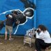 Watch road artists create beautiful motorsport mural to have a good time Adrian Flux Area legends